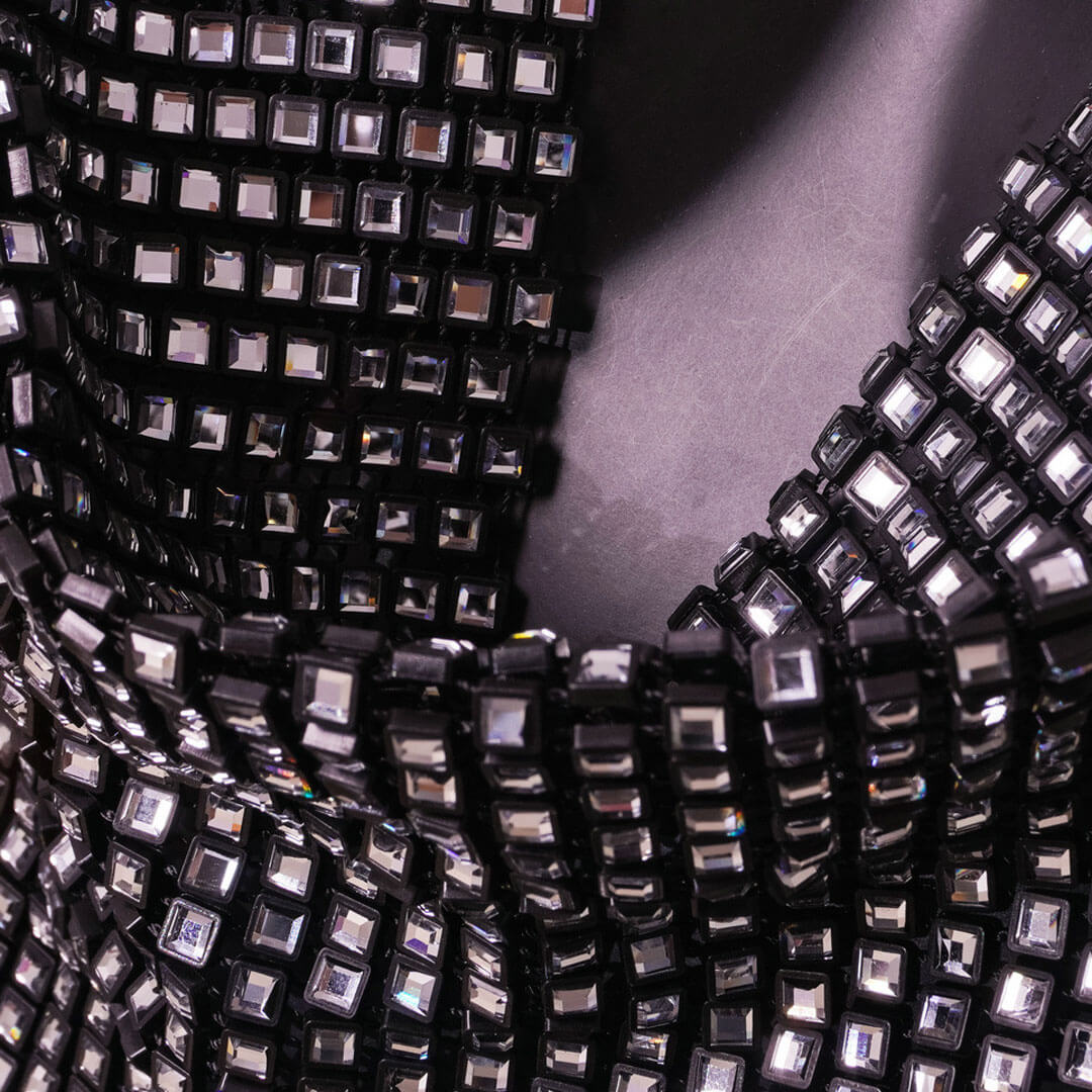Close-up of the sequined fabric of the halter top