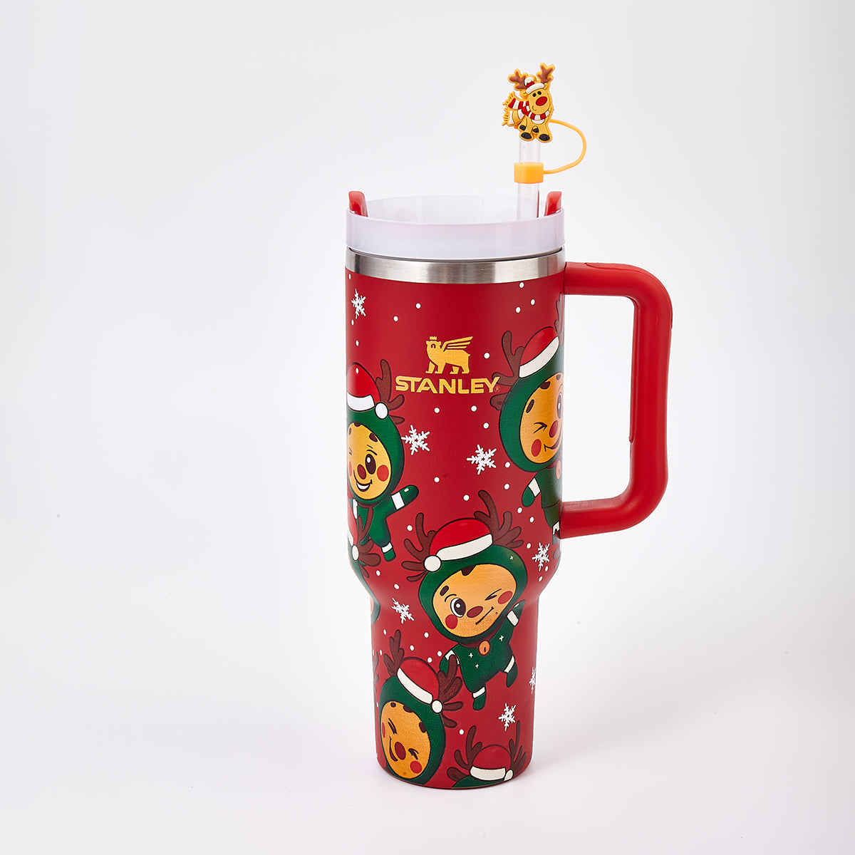 Red Stanley tumbler with holiday reindeer design and straw