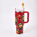 Red Stanley tumbler with holiday reindeer design and straw