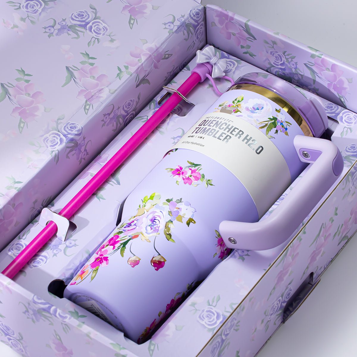Stanley Quencher H2.0 Tumbler with floral print, straw, and gift box packaging