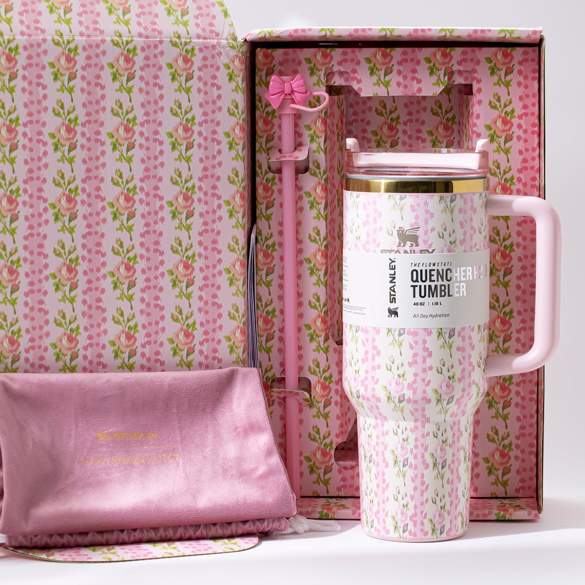 Open Stanley x LoveShackFancy gift box with tumbler, straw, and accessories, pink floral print