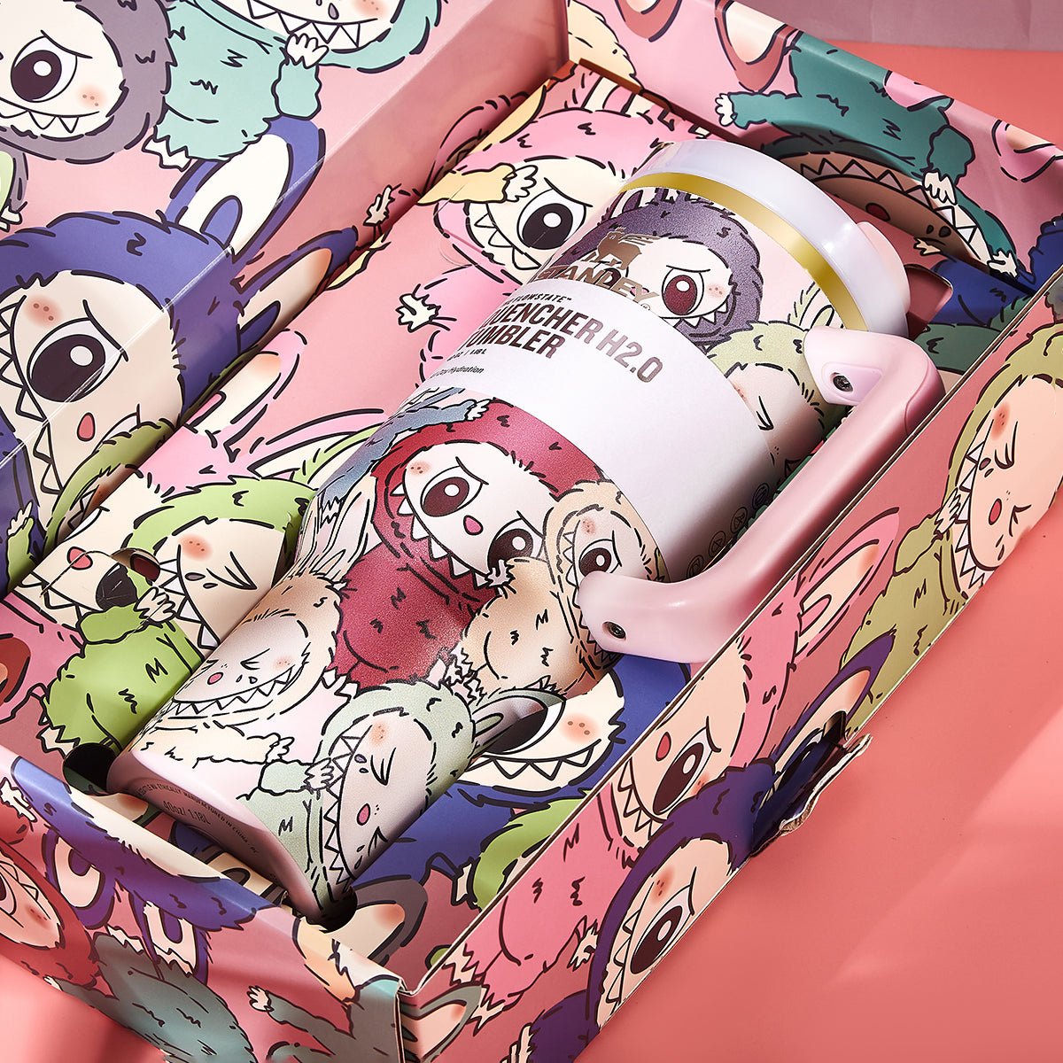 Stanley Quencher H2.0 Tumbler nestled inside its decorative gift box, showcasing the character artwork