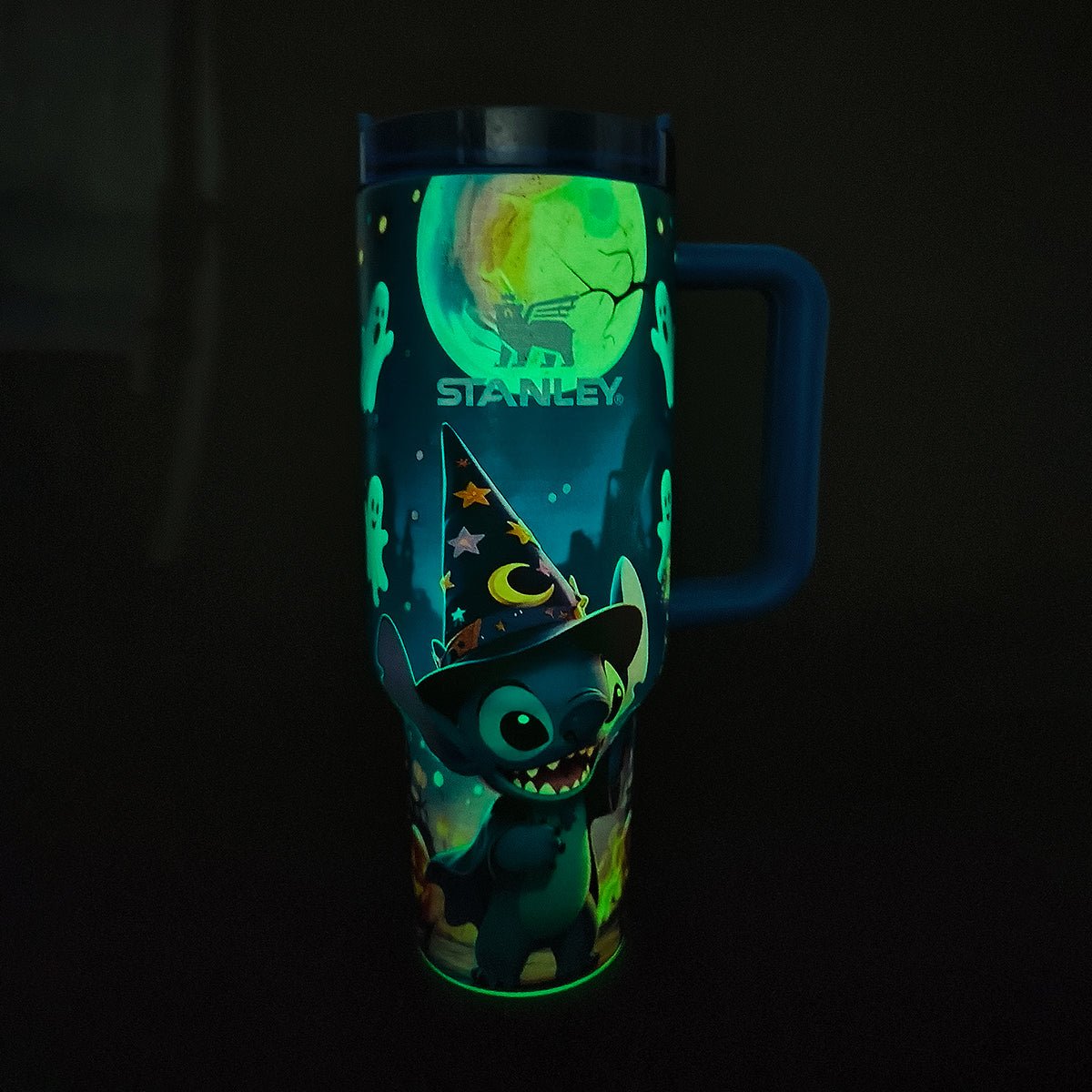 Stanley x Stitch Limited Edition Luminous Tumbler 40 oz in sapphire blue with glow-in-the-dark wizard Stitch artwork - View 3 | Clistos