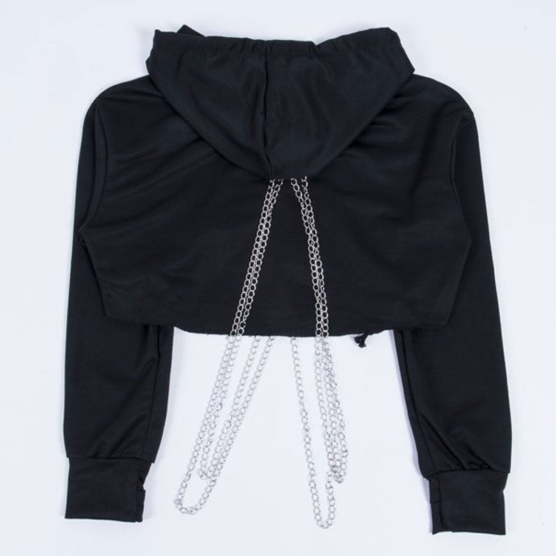 back of a black cropped hoodie with chains
