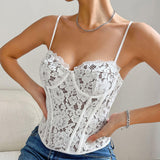 Close-up of a woman in a white lace corset top, showing the intricate details of the lace.