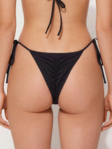back view of black thong bikini bottom with tie sides