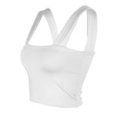 A white crop top with wide straps and a square neckline is shown from a side angle.