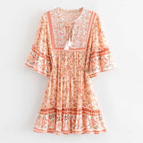 Boho floral print mini dress with bell sleeves and tassel detail - View 17 | Clistos