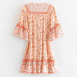 Boho floral print mini dress with bell sleeves and tassel detail - View 18 | Clistos