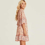 Boho floral print mini dress with bell sleeves and tassel detail - View 7 | Clistos