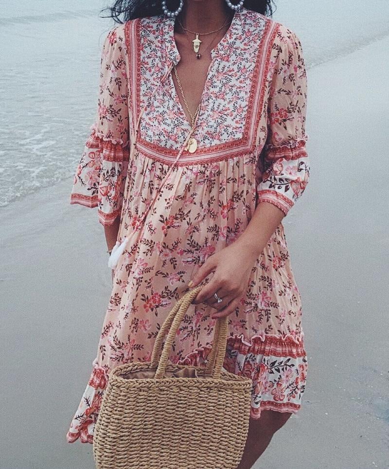 Boho floral print mini dress with bell sleeves and tassel detail - View 9 | Clistos