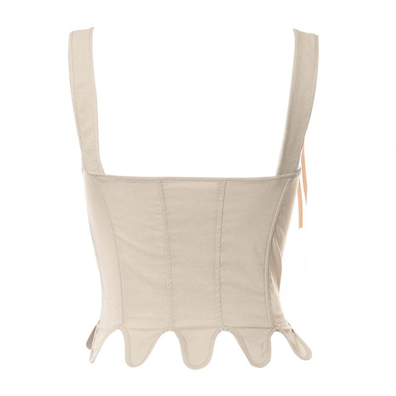 Back view of a beige corset top with straps