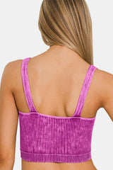back view of a woman wearing a pink and purple ribbed cropped tank top